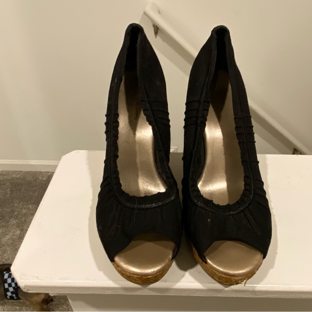 Lightly worn Size 7 black wedge heels